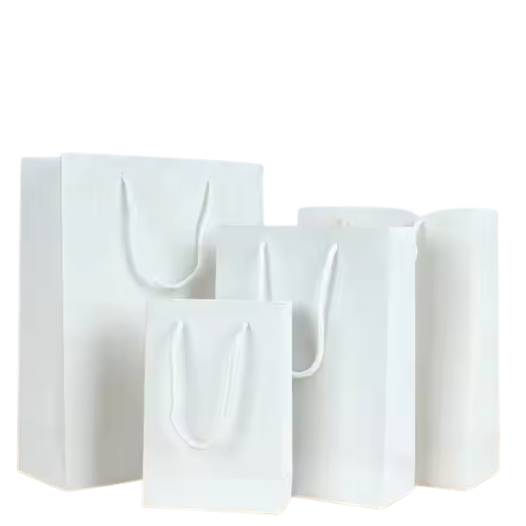 Wrapdit's luxury Matte White Paper Gift Bags with Soft Rope Handles – Sturdy, Reusable, and Elegant for Shopping, Boutiques, Weddings, and Gift Packaging.