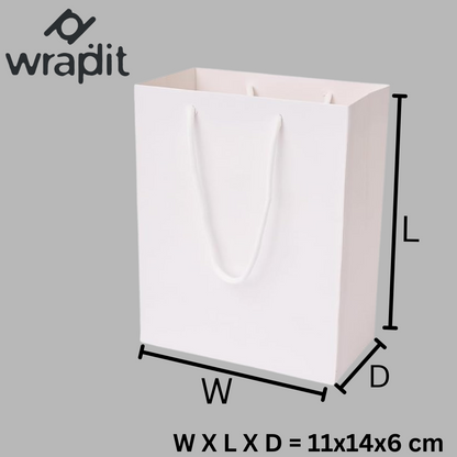 Wrapdit's luxury Matte White Paper Gift Bags with Soft Rope Handles – Sturdy, Reusable, and Elegant for Shopping, Boutiques, Weddings, and Gift Packaging.