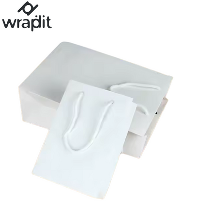 Wrapdit's luxury Matte White Paper Gift Bags with Soft Rope Handles – Sturdy, Reusable, and Elegant for Shopping, Boutiques, Weddings, and Gift Packaging.